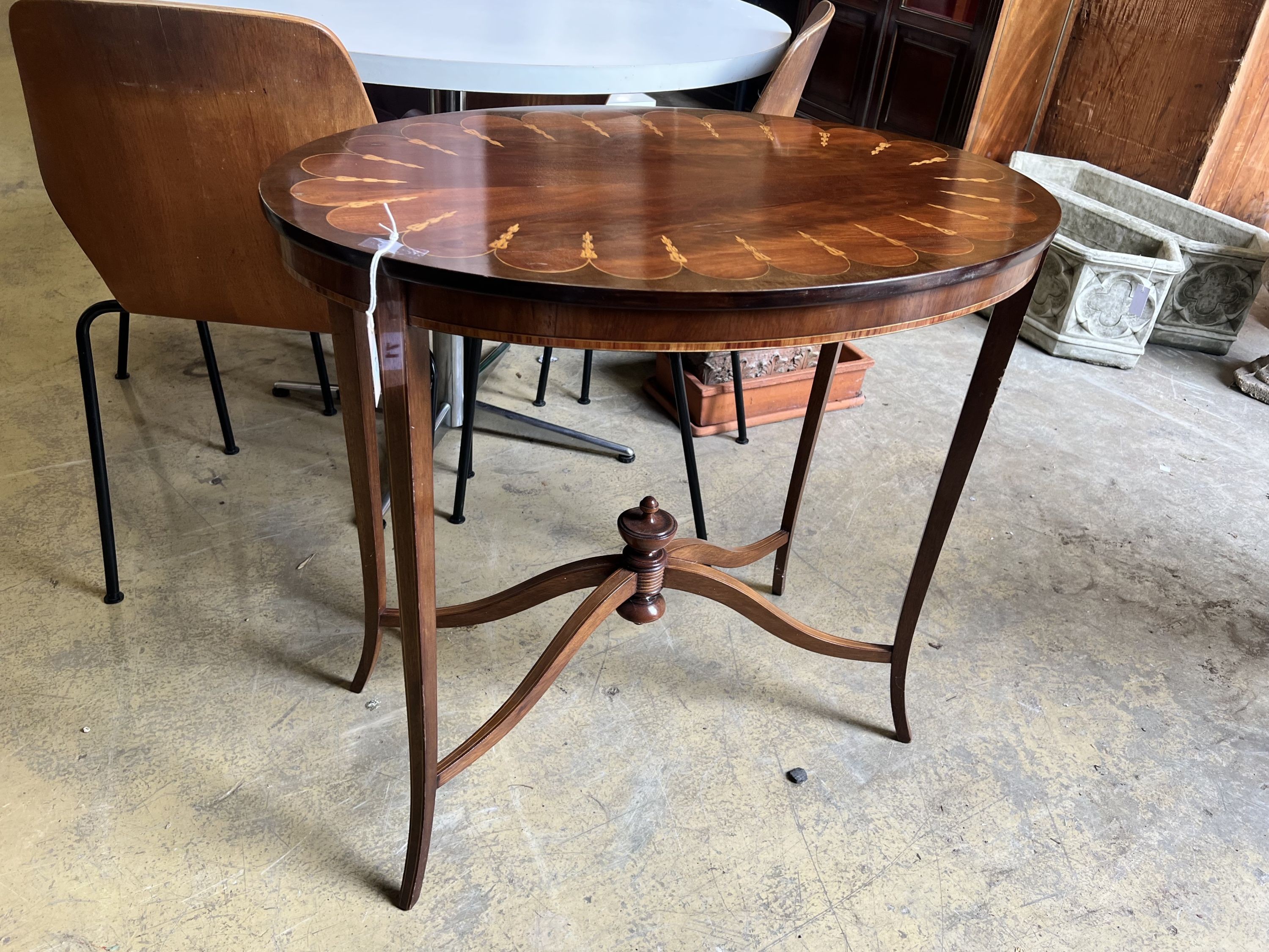 An Edwardian oval inlaid mahogany centre table, width 78cm depth 72cm height 74cm